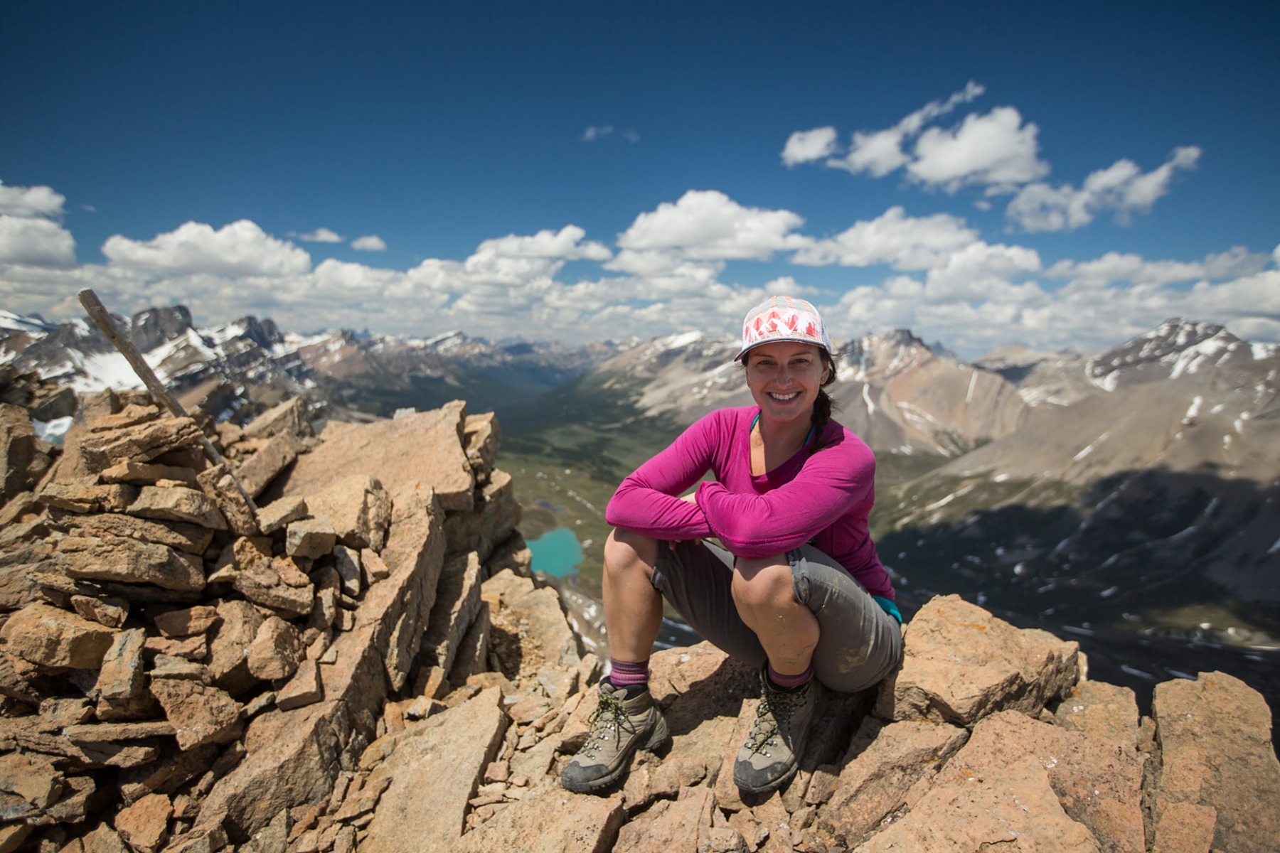 Meghan posing on a mountain top. Photo by Paul Zizka